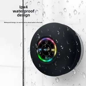 Large suction-cup waterproof Bluetooth speaker with LED glow for bathroom use, portable and versatile waterproof audio device for everyday use