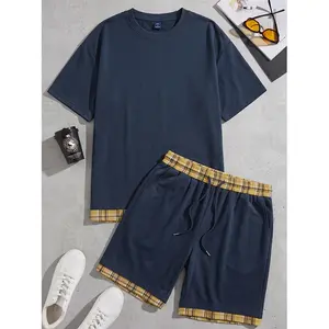 Men’s design-forward plaid patchwork set: faux two-piece with hem detail + shorts; loose short-sleeve summer two-piece set.
