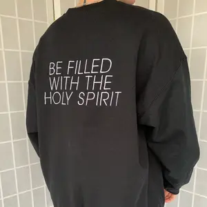 The Dove Signature Black Crewneck