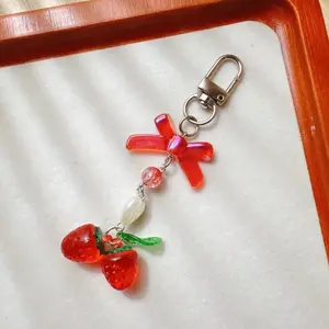 Strawberry Keychain with Dragonfly Charm and Beaded Accents for Bags and Keys