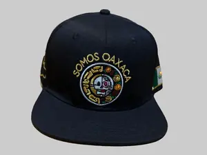 Somos Oaxaca Hat - Black Snapback with Embroidered Logo and Adjustable Back