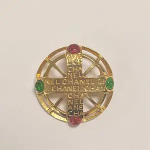 Pre-owned Chanel Gold Globe Red Green Glass Brooch