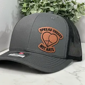 “SPREAD CHEEKS NOT HATE” hat