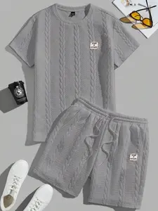 Men's spring/summer solid-color drawstring shorts set. Casual summer set featuring a short-sleeve T-shirt and shorts, suitable for everyday wear and sports. Two-piece set design creates a relaxed and vibrant lifestyle.