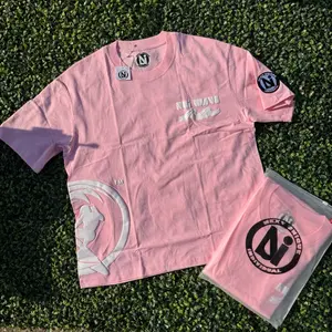 N.U.i. Wave Puff Tee Cropped Fit with Bold Puff-Print Wave Graphic and Custom Sleeve Patch for Unisex Wear
