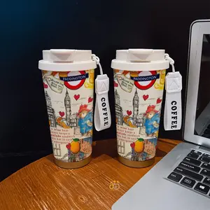 Coffee mug ~ 530 ml / 17.92 oz insulated mug，Paddington Bear London Landmark Marmalade Pattern PrintDouble-walled, leak-proof, travel mug with handle; perfect for coffee lovers, art enthusiasts, sports enthusiasts, and those seeking a gift.