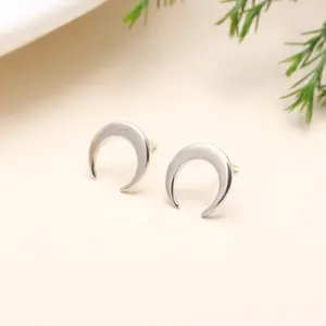 The Lunar Silhouette: Silver Crescent Moon Stud Earrings