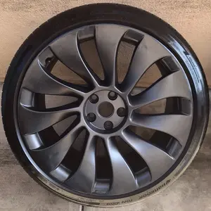 1 Tesla Model Y Uberturbine 21” wheel  Set and rim no tire also available  Center cap not included in price