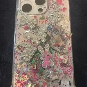 Purple Junk Case with Rhinestone Accents and Glittery Design for iPhone 15 Pro Max