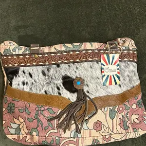 Western Style Women's Bag with Floral Pattern and Cowhide Accents