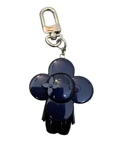 Pre-owned Louis Vuitton resin and wood Bag Accessories Navy Resin Vivienne Bag Charm/Keychain