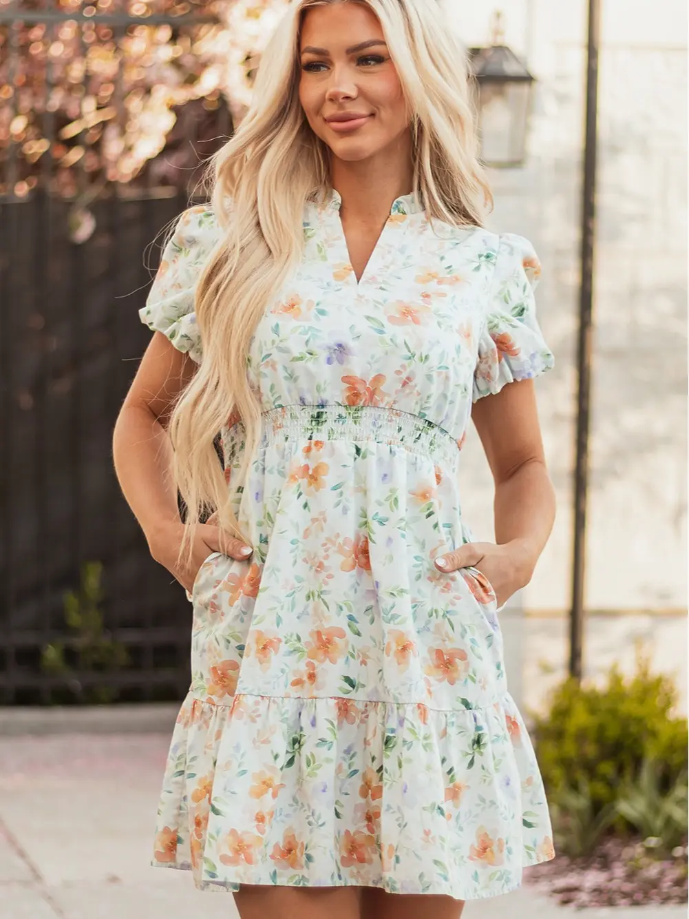 Beige Floral Print Shirred High Waist Puff Sleeve Mini Dress, V Neck, Puff Short Sleeves and Smocked High Waist.
