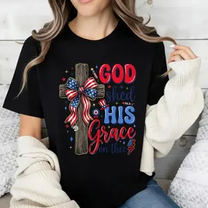 Casual Patriotic Women's T-Shirt With American Flag Cross And God Shed His Grace On Thee Design For Summer And Holiday Wear Perfect Gift For Christian Lovers And Family
