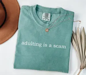Comfort Colors Adulting Is A Scam T-Shirt, Soft Cotton Crewneck Shirt for Men and Women, Gift for Him or Her, Unisex Stylish