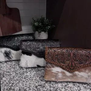 Cow Hides Purse with Intricate Floral Embossing and Versatile Color Options