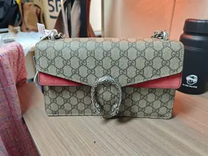 Pre-owned GUCCI Italy Crossbody Bags Dionysus Monochrome Red Crossbody Bag with GG Pattern and Silver Hardware Elegant Design Versatile Functional