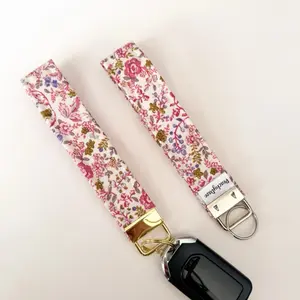 Pink Floral Keychain Wristlet - Floral Pattern, Gold Clip, Adjustable Design, Ideal for Keyring Use