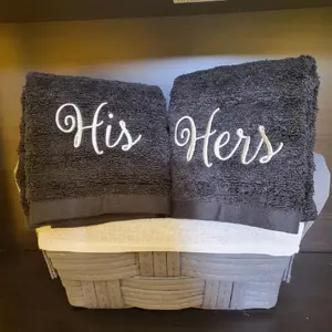 His and Hers embroidered towels.