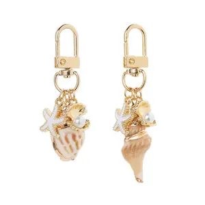 Beach Shell Keychain, Natural Conch & Starfish Charm with Imitation Pearl, Gold Alloy Bag Pendant for Women, Ocean Theme Keyring Black Heart Tassel Long Earrings