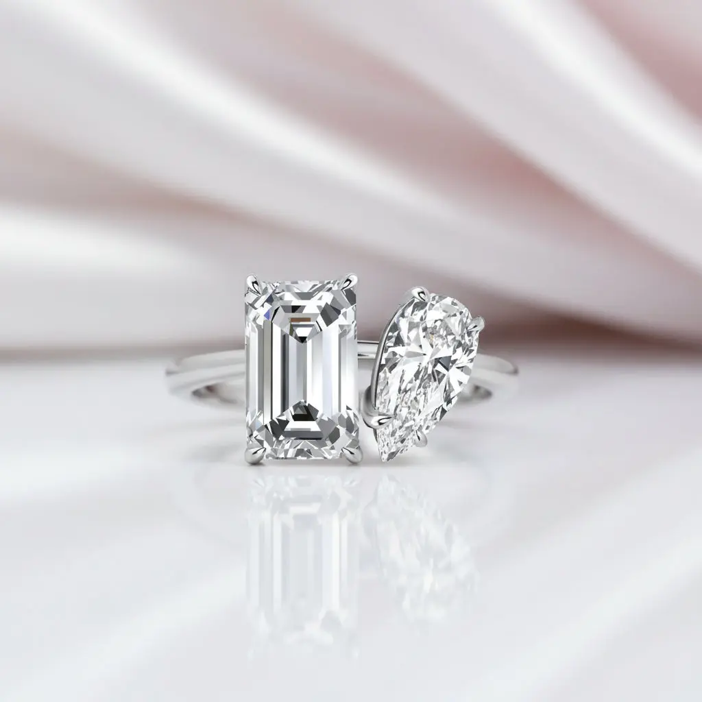 Unique Emerald Cut & Pear Cut Double Stone Engagement Ring
