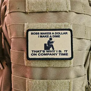 Boss makes a dollar I make a dime that's why I poop on company time 2"x3" morale patch with hook and loop backing tan