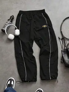 Men's Casual Sporty Long Pants, Loose Fit with Elastic Cuffs, Fashion Letter Print, Lightweight Fabric for Daily Wear