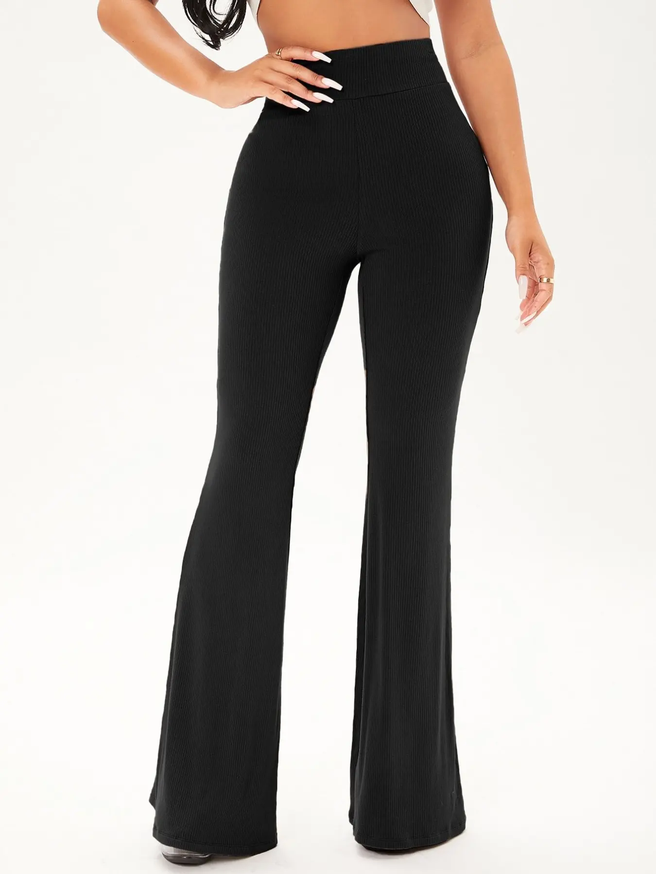 A women's black fashionable Minimalist office style slim fit micro flared pants, Womenswear, with a micro flared design that accentuates curves and is suitable for commuting to work, shopping, and outdoor wear, Work Office Clothes