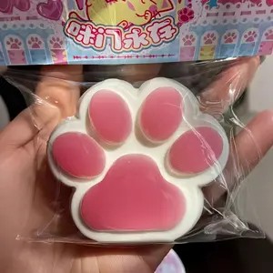 cross-border bestseller, cement-textured cat paw squishy toy, slow rebound, green grape, orange, same style as on Xiaohongshu, stress relief