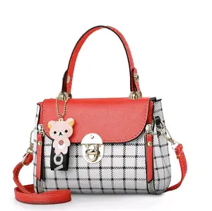 Black Quilted Fanny Pack with Red Accents and Plaid Design for Everyday Use