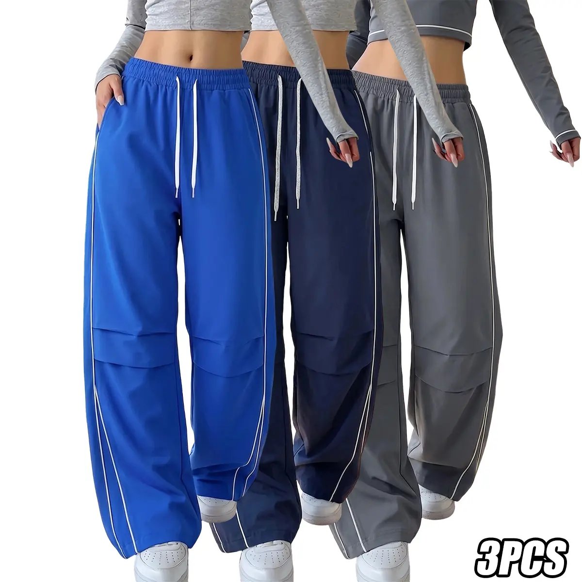 JOGWAVE 3PCS women’s wide-leg cargo pants featuring asymmetrical striped arcs on both sides, an elastic waistband with drawstring, urban casual style, Y2K aesthetic, simple yet fashionable