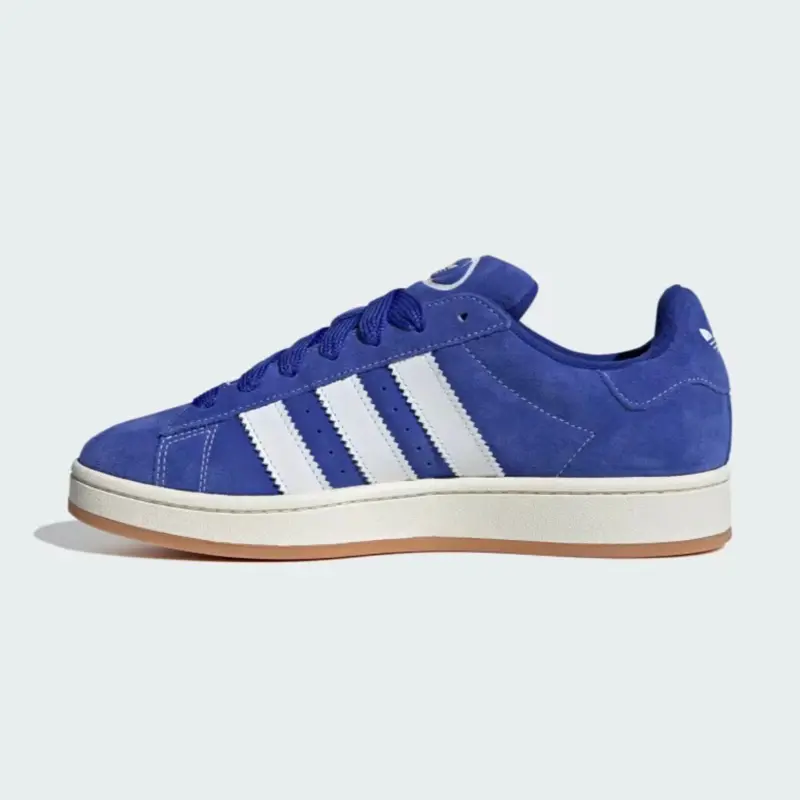 Adidas Campus 00s Semi Lucid Blue Men’s Suede Sneakers, Featuring a Retro Skate-Inspired Design, Soft Suede Upper, Chunky Sole, Cloud White 3-Stripes Detail, Stylish Colorway, Comfortable Fit, and Versatile Everyday Appeal.