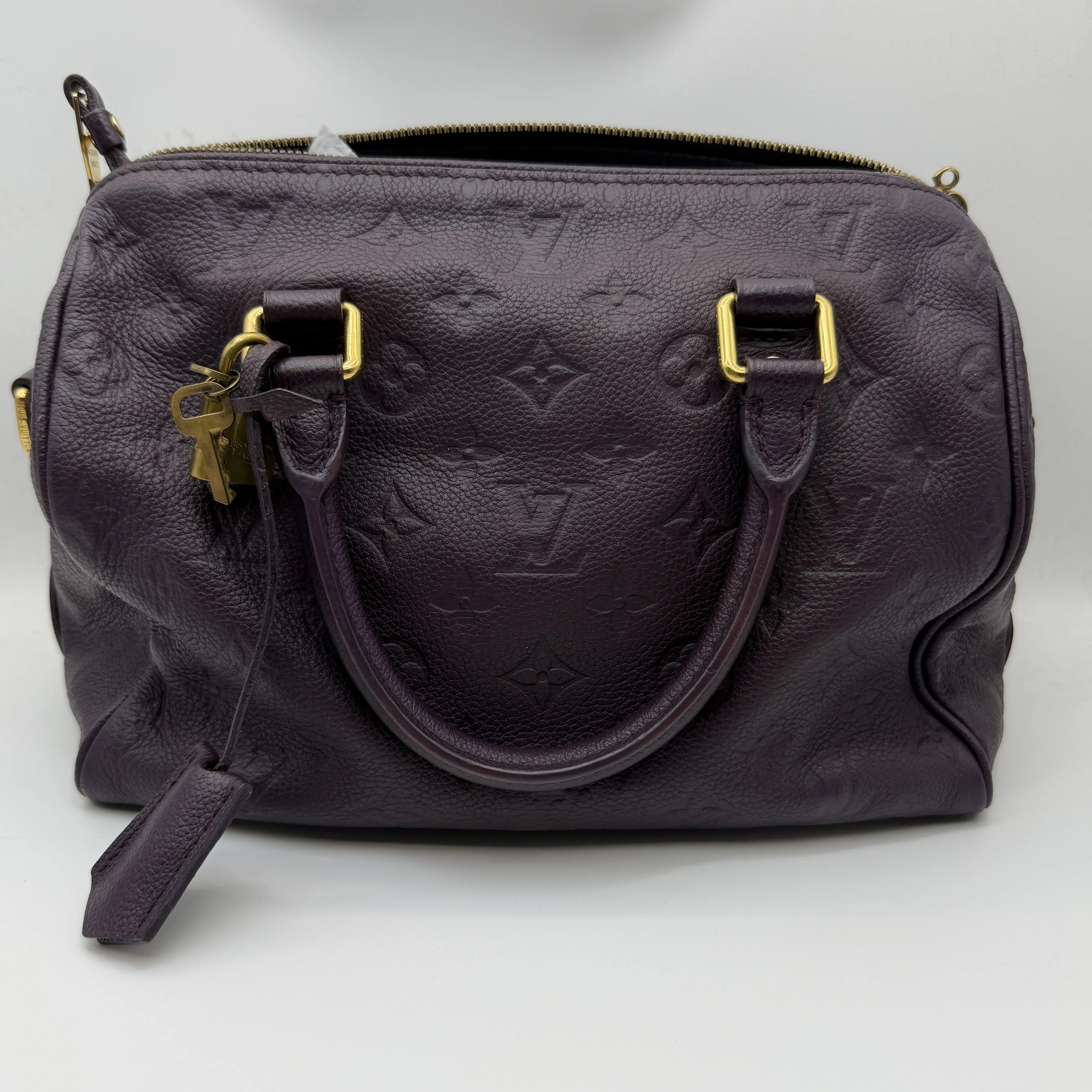 Pre-owned Louis Vuitton LV Speedy Bandoulière embossed calfskin Boston bag in burgundy with gold hardware