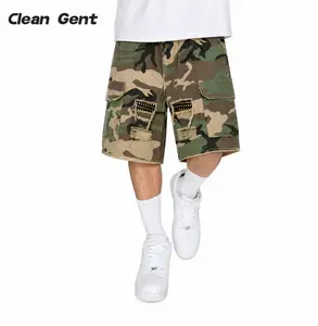 Clean Gent Men’s camouflage loose cargo shorts with patch details, drawstring elastic waistband; cotton fabric for comfort and a stylish workwear look. Street style design with flap pockets—summer men’s shorts suitable for everyday wear.