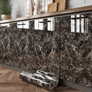 Self-adhesive high-gloss cabinet film with a marble pattern, waterproof and oil-resistant. Ideal for kitchen cabinets, doors, and backsplashes. Peel-and-stick, removable wall sticker for home décor in kitchens, living rooms, and bedrooms.