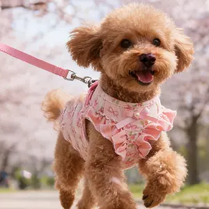 A Pet Harness And Leash Set Designed for Dogs, Featuring a Vest-Style Harness with Snap Buttons for Double-Layer Protection. Made from Soft Polyester Fabric, It Is Comfortable And Breathable