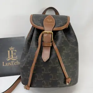 Pre-owned Celine Mini Folio Backpack in Triomphe Canvas with Calfskin Leather Trim