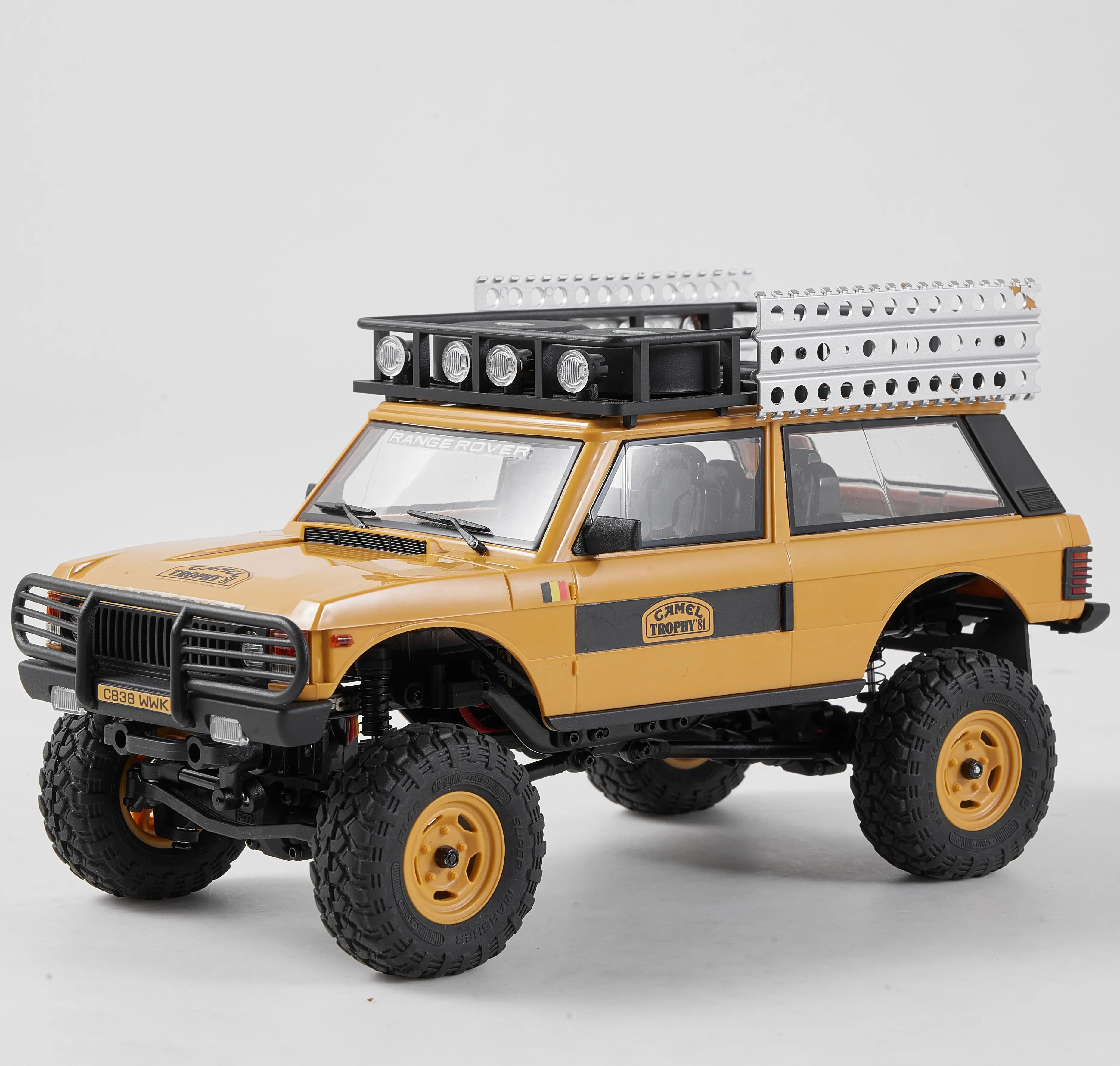 FMS 1:24 FCX24M First-Generation Range Rover RTR Yellow RC Controlled Car - Land Rover Family, 2.4Ghz Off-Road Durable Rock Crawler, Battery-Powered, with Lighting Effects, Speed Switch, Accessory Packs for Adults