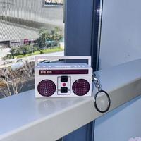 White recorder keychain