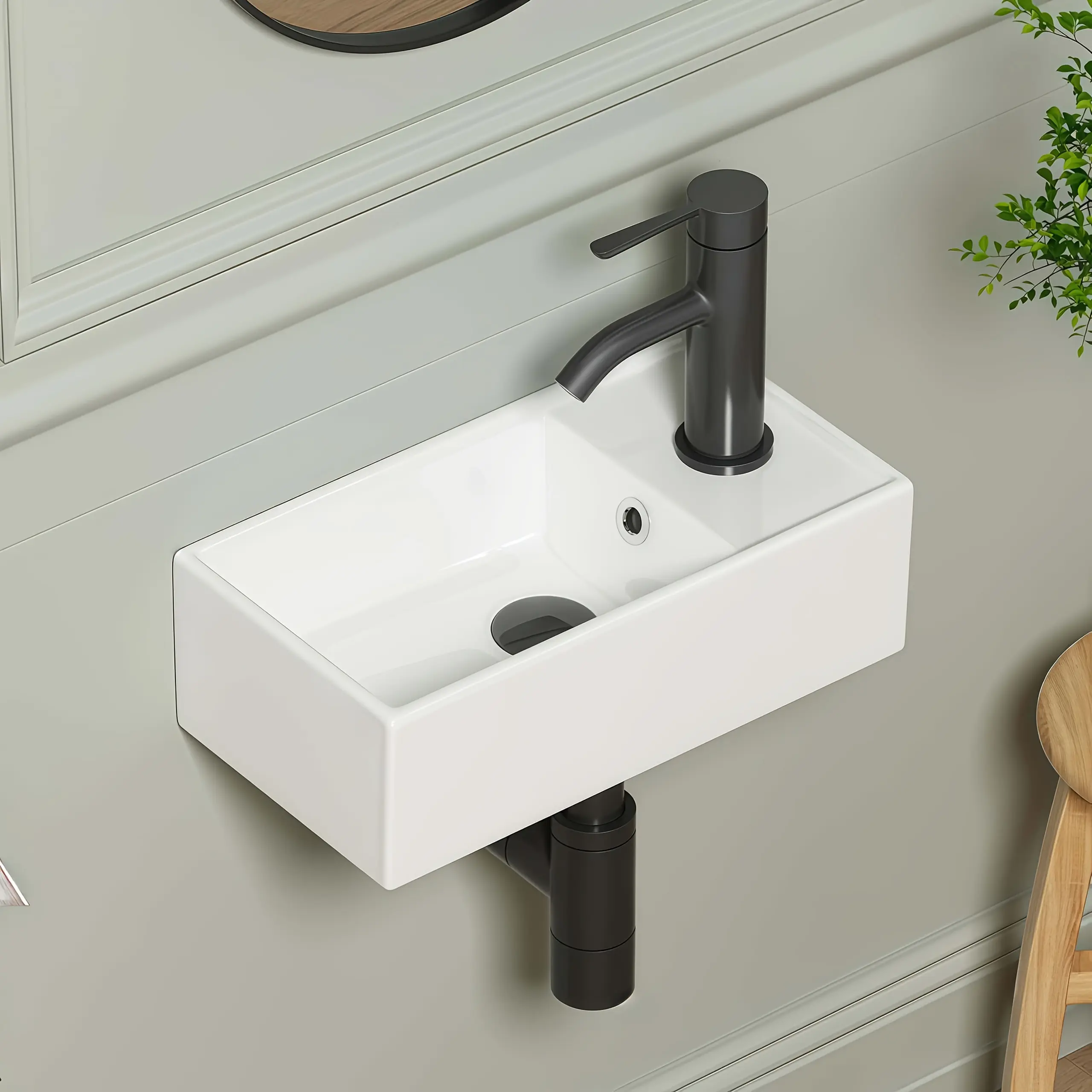 Wall-Mounted White Bathroom Sink - Compact Design with Black Faucet and Drain
