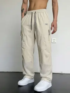 1-pack men’s ice silk quick-dry cargo straight pants with side zipper pockets and mesh paneling, drawstring waistband for breathability and moisture wicking, loose fit that flatters the figure, suitable for summer sports and outdoor wear.