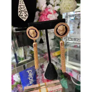 Lion's Chain Earrings with Decorative Elements and Tassels, Featuring Lion Design and Black Base