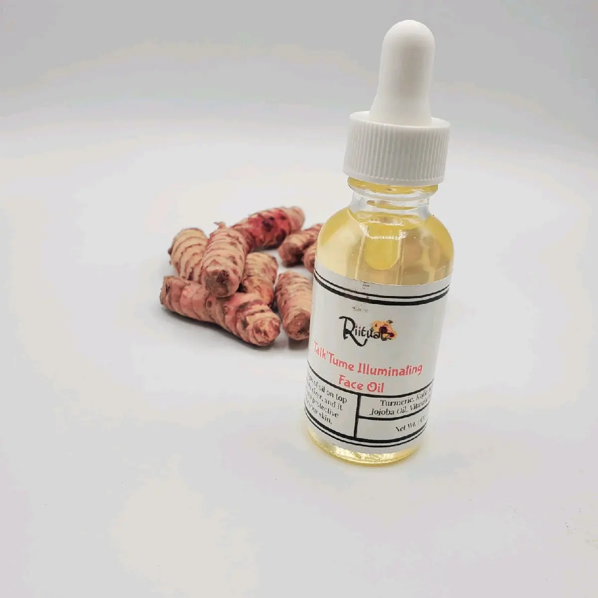Talk'Tume illuminating Face Oil