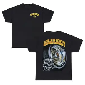 Lowrider "Rolling on Them Classics" T-Shirt – Black Graphic Tee Featuring Bold Lowrider Logo and Iconic Custom Car Wheel Design, Celebrating Car Culture and Style.