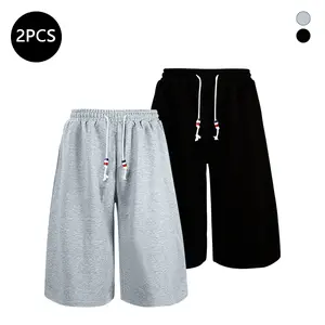 2-pack men’s drawstring waist pants with a loose fit and 7/8 length shorts in solid colors for street style; suitable for everyday wear and summer sports shorts.