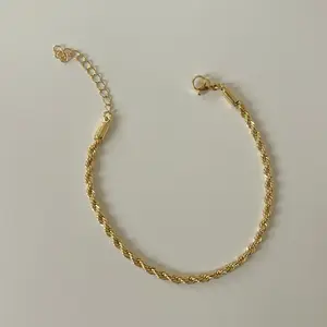 Elegant Gold Color Twist Design Bracelet with Secure Clasp for Everyday Wear
