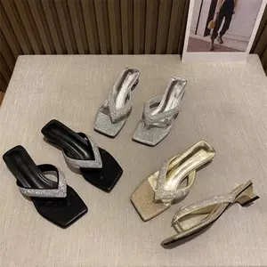 Elegant summer rhinestone flip-flops with a stylish design, thick heel, and fashionable thong sandals for women
