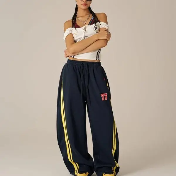 Aelfric Eden Unisex Poly-Cotton Casual Loose Joggers - Retro Sport Bold Yellow Stripe, Baggy Wide-Leg Barrel Sweatpants, Drawstring Elastic Waist, 77 Graphic Patch, Sporty Chic Athleisure Style Bottoms, Street Fashion Jogger, Comfy Pants