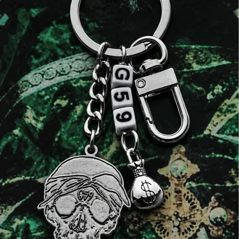 Stainless Steel Skull Keychain with Beads & Money Bag Charm – Gothic Hip Hop Accessory