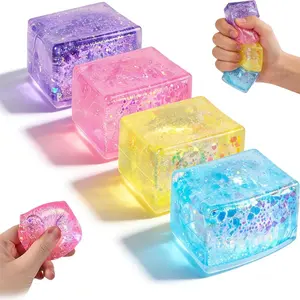 4-Pack Soft Plastic Glitter Ice Cube Fidget Squishies, Sensory Square Squeeze Stress Balls for Kids, Stress Relief Tools for Classroom Prizes, Sports & Outdoor Fan Shop Gaming Accessories