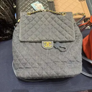 Pre-owned CHANEL H5 light blue denim backpack bz051911